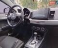 Черный Мицубиси Лансер, объемом двигателя 2 л и пробегом 265 тыс. км за 5500 $, фото 5 на Automoto.ua