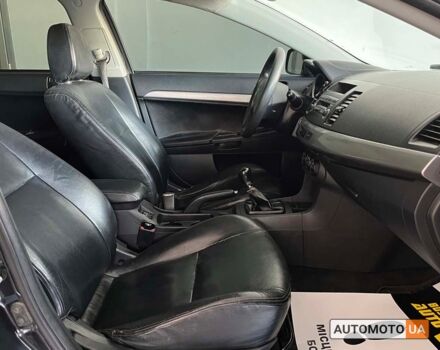 Черный Мицубиси Лансер, объемом двигателя 1.5 л и пробегом 245 тыс. км за 5100 $, фото 8 на Automoto.ua