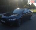 Черный Мицубиси Лансер, объемом двигателя 1.5 л и пробегом 157 тыс. км за 6900 $, фото 1 на Automoto.ua