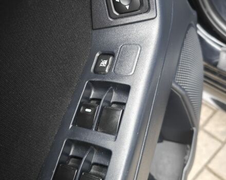 Черный Мицубиси Лансер, объемом двигателя 2 л и пробегом 228 тыс. км за 7000 $, фото 6 на Automoto.ua