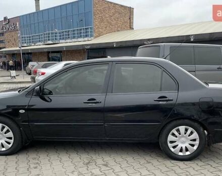 Чорний Міцубісі Lancer, об'ємом двигуна 1.6 л та пробігом 186 тис. км за 5500 $, фото 1 на Automoto.ua