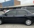 Чорний Міцубісі Lancer, об'ємом двигуна 1.6 л та пробігом 186 тис. км за 5500 $, фото 1 на Automoto.ua