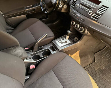 Чорний Міцубісі Lancer, об'ємом двигуна 2 л та пробігом 204 тис. км за 7500 $, фото 7 на Automoto.ua