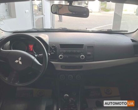 Черный Мицубиси Лансер, объемом двигателя 1.5 л и пробегом 245 тыс. км за 5100 $, фото 13 на Automoto.ua