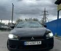 Чорний Міцубісі Lancer, об'ємом двигуна 2 л та пробігом 234 тис. км за 6199 $, фото 1 на Automoto.ua