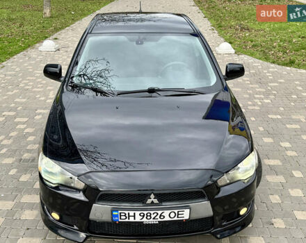 Черный Мицубиси Лансер, объемом двигателя 2 л и пробегом 221 тыс. км за 6750 $, фото 13 на Automoto.ua