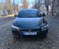 Черный Мицубиси Лансер, объемом двигателя 2 л и пробегом 217 тыс. км за 7900 $, фото 1 на Automoto.ua