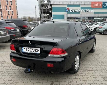 Чорний Міцубісі Lancer, об'ємом двигуна 1.6 л та пробігом 186 тис. км за 5500 $, фото 5 на Automoto.ua