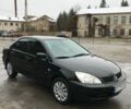 Черный Мицубиси Лансер, объемом двигателя 1.6 л и пробегом 130 тыс. км за 6100 $, фото 1 на Automoto.ua