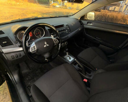 Чорний Міцубісі Lancer, об'ємом двигуна 2 л та пробігом 204 тис. км за 7500 $, фото 6 на Automoto.ua