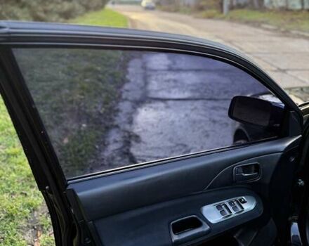 Чорний Міцубісі Lancer, об'ємом двигуна 1.6 л та пробігом 98 тис. км за 5600 $, фото 6 на Automoto.ua