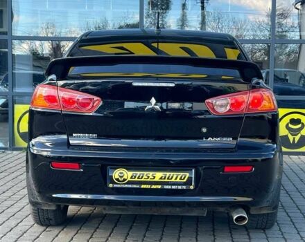 Черный Мицубиси Лансер, объемом двигателя 2 л и пробегом 215 тыс. км за 7000 $, фото 5 на Automoto.ua