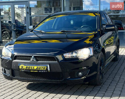 Черный Мицубиси Лансер, объемом двигателя 2 л и пробегом 215 тыс. км за 7000 $, фото 2 на Automoto.ua