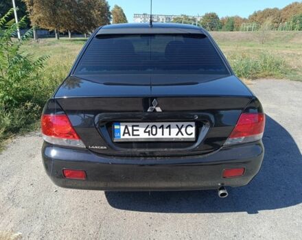 Чорний Міцубісі Lancer, об'ємом двигуна 1.6 л та пробігом 215 тис. км за 5200 $, фото 1 на Automoto.ua