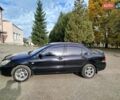Черный Мицубиси Лансер, объемом двигателя 1.58 л и пробегом 78 тыс. км за 6500 $, фото 1 на Automoto.ua