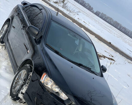 Чорний Міцубісі Lancer, об'ємом двигуна 2 л та пробігом 200 тис. км за 7200 $, фото 11 на Automoto.ua