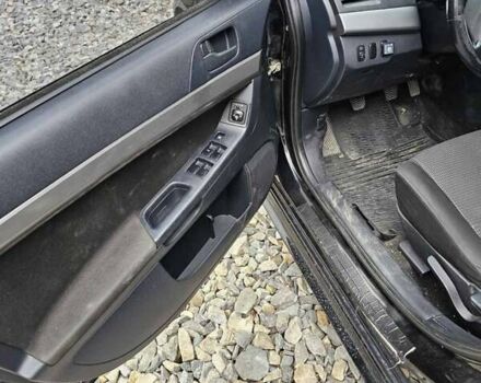 Чорний Міцубісі Lancer, об'ємом двигуна 2 л та пробігом 214 тис. км за 5900 $, фото 11 на Automoto.ua