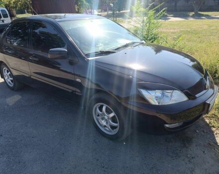 Чорний Міцубісі Lancer, об'ємом двигуна 1.6 л та пробігом 215 тис. км за 5200 $, фото 7 на Automoto.ua