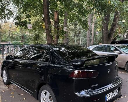 Чорний Міцубісі Lancer, об'ємом двигуна 2 л та пробігом 253 тис. км за 7300 $, фото 3 на Automoto.ua