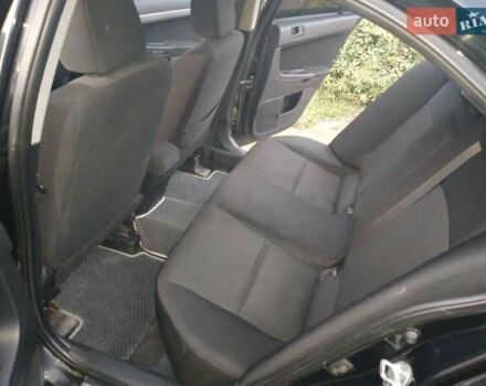 Чорний Міцубісі Lancer, об'ємом двигуна 2 л та пробігом 180 тис. км за 6999 $, фото 1 на Automoto.ua