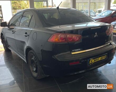 Черный Мицубиси Лансер, объемом двигателя 1.5 л и пробегом 245 тыс. км за 5100 $, фото 4 на Automoto.ua