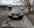 Черный Мицубиси Лансер, объемом двигателя 1.58 л и пробегом 94 тыс. км за 6000 $, фото 1 на Automoto.ua