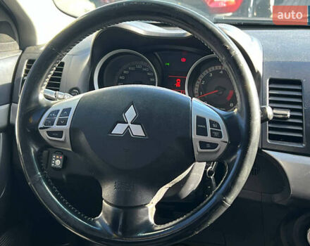 Черный Мицубиси Лансер, объемом двигателя 2 л и пробегом 215 тыс. км за 7000 $, фото 14 на Automoto.ua