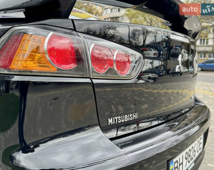 Черный Мицубиси Лансер, объемом двигателя 2 л и пробегом 221 тыс. км за 6750 $, фото 32 на Automoto.ua