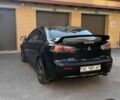 Чорний Міцубісі Lancer, об'ємом двигуна 2 л та пробігом 209 тис. км за 7600 $, фото 4 на Automoto.ua