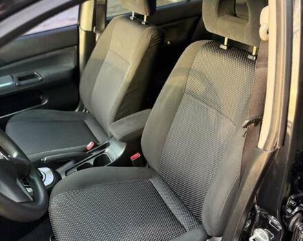 Чорний Міцубісі Lancer, об'ємом двигуна 1.6 л та пробігом 98 тис. км за 5600 $, фото 27 на Automoto.ua