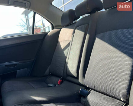 Черный Мицубиси Лансер, объемом двигателя 2 л и пробегом 215 тыс. км за 7000 $, фото 15 на Automoto.ua