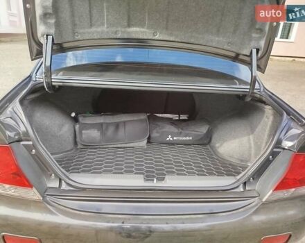 Черный Мицубиси Лансер, объемом двигателя 1.58 л и пробегом 78 тыс. км за 6500 $, фото 15 на Automoto.ua