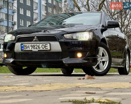 Черный Мицубиси Лансер, объемом двигателя 2 л и пробегом 221 тыс. км за 6750 $, фото 5 на Automoto.ua
