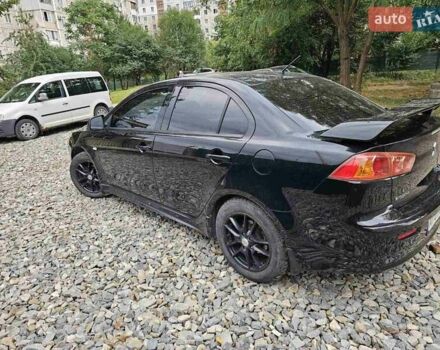 Чорний Міцубісі Lancer, об'ємом двигуна 2 л та пробігом 214 тис. км за 5900 $, фото 5 на Automoto.ua