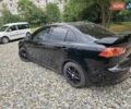 Чорний Міцубісі Lancer, об'ємом двигуна 2 л та пробігом 214 тис. км за 5900 $, фото 5 на Automoto.ua