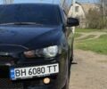 Чорний Міцубісі Lancer, об'ємом двигуна 2 л та пробігом 266 тис. км за 7200 $, фото 1 на Automoto.ua