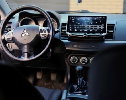 Чорний Міцубісі Lancer, об'ємом двигуна 2 л та пробігом 209 тис. км за 7600 $, фото 7 на Automoto.ua