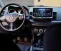 Чорний Міцубісі Lancer, об'ємом двигуна 2 л та пробігом 209 тис. км за 7600 $, фото 7 на Automoto.ua