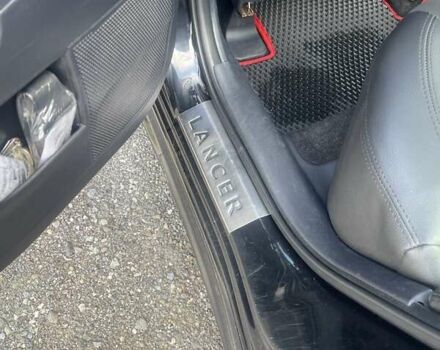 Черный Мицубиси Лансер, объемом двигателя 2 л и пробегом 201 тыс. км за 7000 $, фото 8 на Automoto.ua