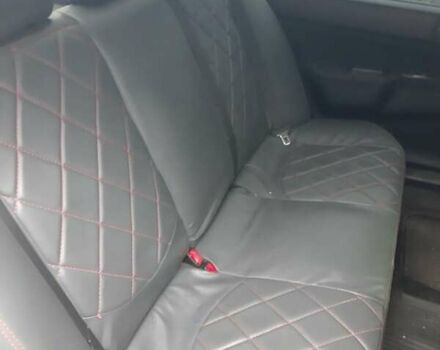 Черный Мицубиси Лансер, объемом двигателя 1.6 л и пробегом 256 тыс. км за 6300 $, фото 4 на Automoto.ua