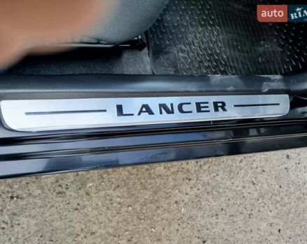 Черный Мицубиси Лансер, объемом двигателя 1.58 л и пробегом 78 тыс. км за 6500 $, фото 29 на Automoto.ua