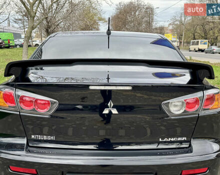Черный Мицубиси Лансер, объемом двигателя 2 л и пробегом 221 тыс. км за 6750 $, фото 25 на Automoto.ua