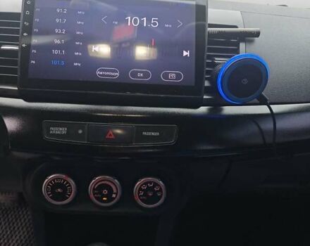 Черный Мицубиси Лансер, объемом двигателя 2 л и пробегом 228 тыс. км за 7000 $, фото 8 на Automoto.ua