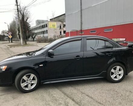 Чорний Міцубісі Lancer, об'ємом двигуна 2 л та пробігом 215 тис. км за 7750 $, фото 16 на Automoto.ua