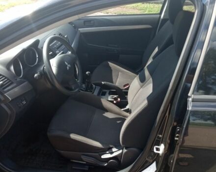 Мицубиси Лансер 2009 в Бобровице на Automoto.ua Черный Мицубиси Лансер, объемом двигателя 1.5 л и пробегом 156 тыс. км за 6700 $, фото 6 на Automoto.ua