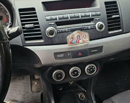 Чорний Міцубісі Lancer, об'ємом двигуна 2 л та пробігом 214 тис. км за 5900 $, фото 9 на Automoto.ua