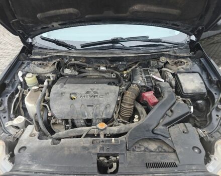 Черный Мицубиси Лансер, объемом двигателя 2 л и пробегом 228 тыс. км за 7000 $, фото 10 на Automoto.ua