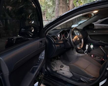 Чорний Міцубісі Lancer, об'ємом двигуна 2 л та пробігом 253 тис. км за 7300 $, фото 9 на Automoto.ua