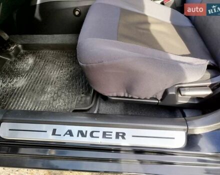 Черный Мицубиси Лансер, объемом двигателя 1.58 л и пробегом 78 тыс. км за 6500 $, фото 27 на Automoto.ua