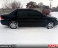 Черный Мицубиси Лансер, объемом двигателя 1.6 л и пробегом 94 тыс. км за 6200 $, фото 2 на Automoto.ua